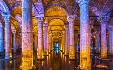 Basilica Cistern's illuminated columns in Istanbul, part of Combo Tour with Blue Mosque and Hagia Sophia.