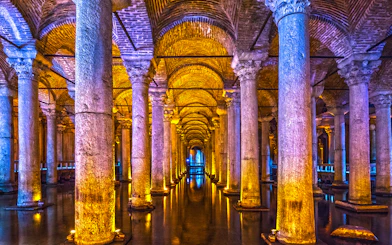 Basilica Cistern's illuminated columns in Istanbul, part of Combo Tour with Blue Mosque and Hagia Sophia.