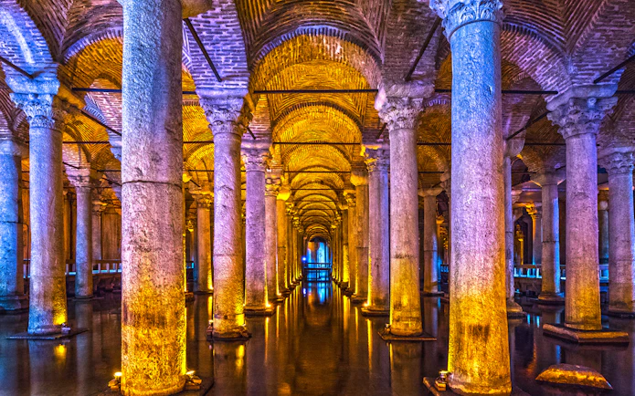 Basilica Cistern's illuminated columns in Istanbul, part of Combo Tour with Blue Mosque and Hagia Sophia.