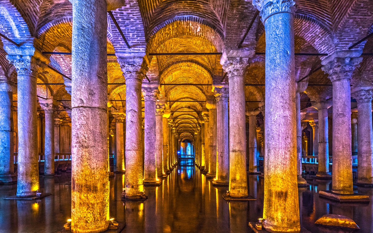 Basilica Cistern's illuminated columns in Istanbul, part of Combo Tour with Blue Mosque and Hagia Sophia.