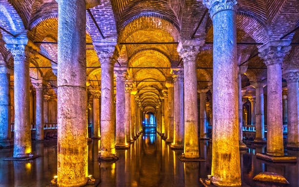 Basilica Cistern's illuminated columns in Istanbul, part of Combo Tour with Blue Mosque and Hagia Sophia.