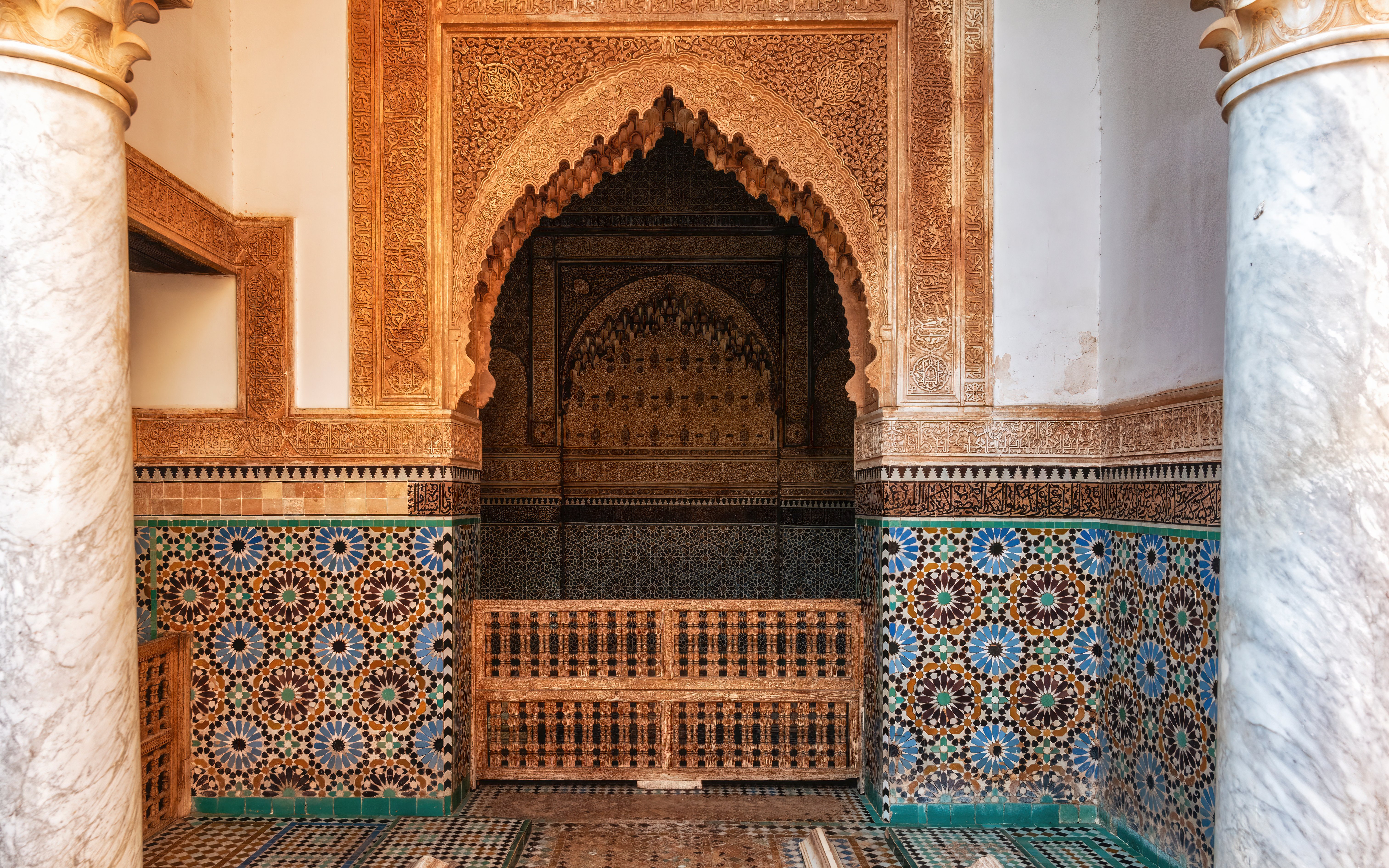 Ornate archway and mosaic tiles in Saadian Tombs, Marrakech.