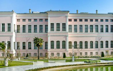 Dolmabahçe Palace Harem exterior with garden view in Istanbul.