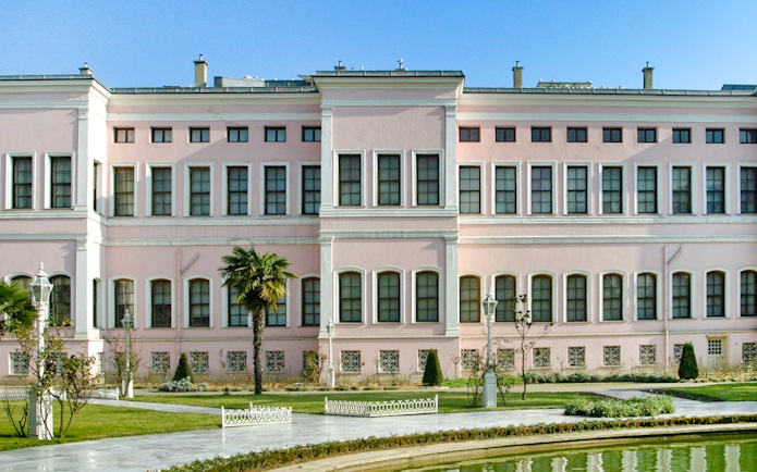 Dolmabahçe Palace Harem exterior with garden view in Istanbul.