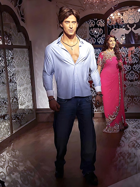 Wax figures at Madame Tussauds Singapore exhibit.
