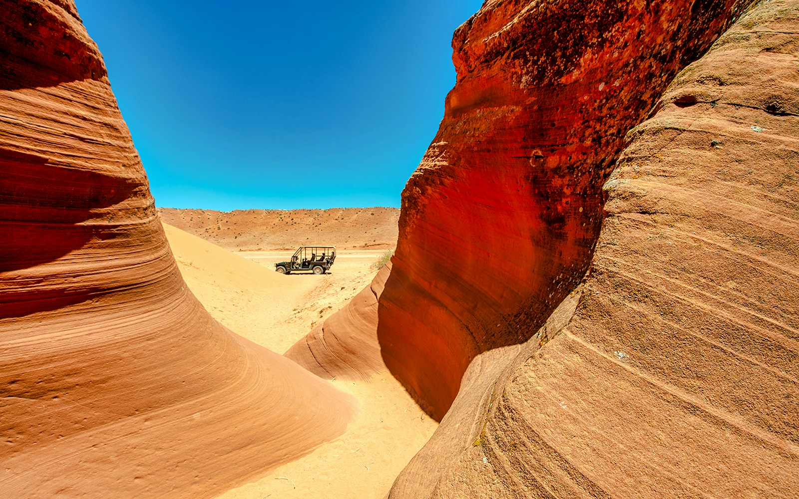 Jeep tour through the red rock formations of Antelope Canyon, Arizona.