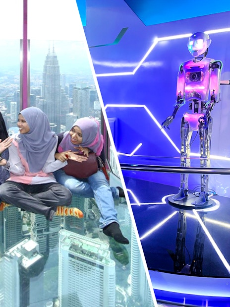 Female tourists sitting on KL Tower observation deck with city view.