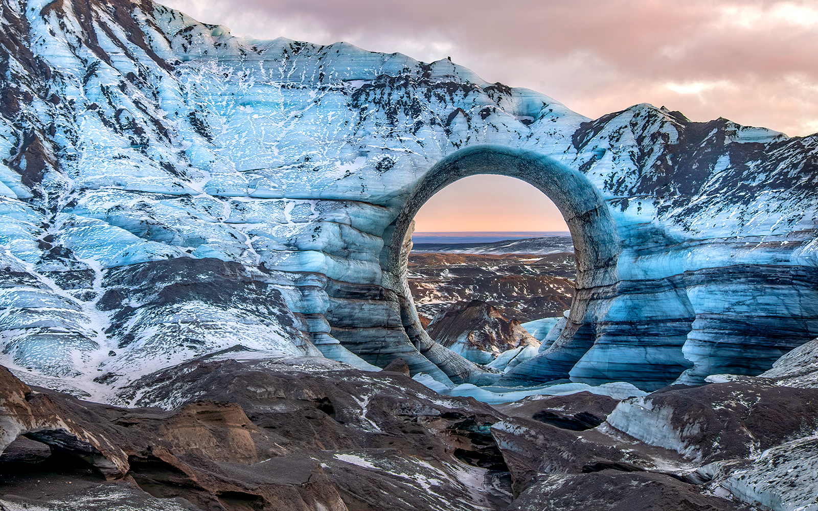 Ice cave with natural arch in Kötlujökull glacier, Vik, Iceland.