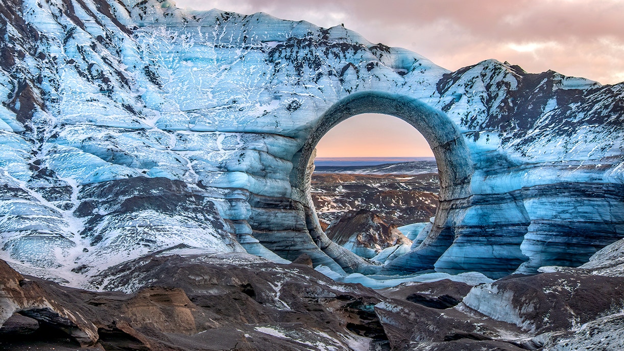 Ice cave with natural arch in Kötlujökull glacier, Vik, Iceland.