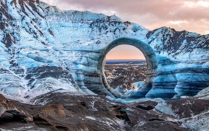 Ice cave with natural arch in Kötlujökull glacier, Vik, Iceland.