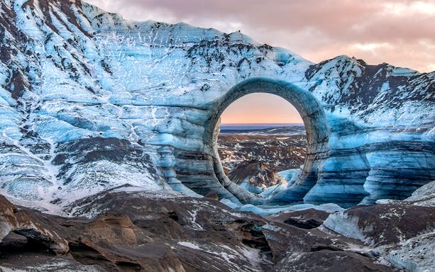 Ice cave with natural arch in Kötlujökull glacier, Vik, Iceland.