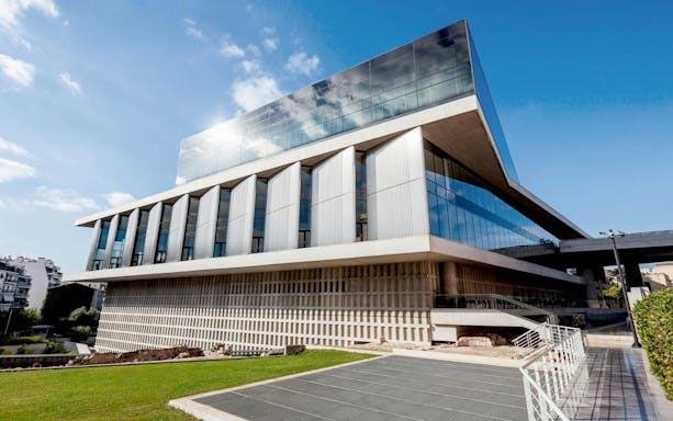 Acropolis Museum in Athens with modern architecture and glass facade.
