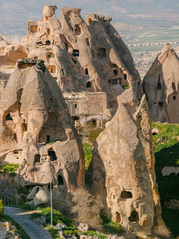 Rock formations with carved dwellings at Derinkuyu Underground City, Cappadocia, Turkey.