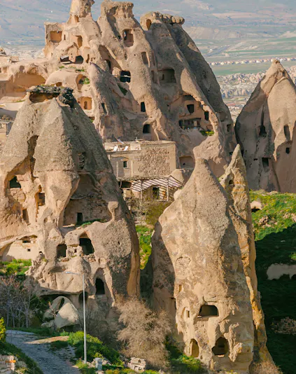 Rock formations with carved dwellings at Derinkuyu Underground City, Cappadocia, Turkey.