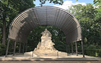 Statue of Goethe under a metal canopy in Berlin's Tiergarten.