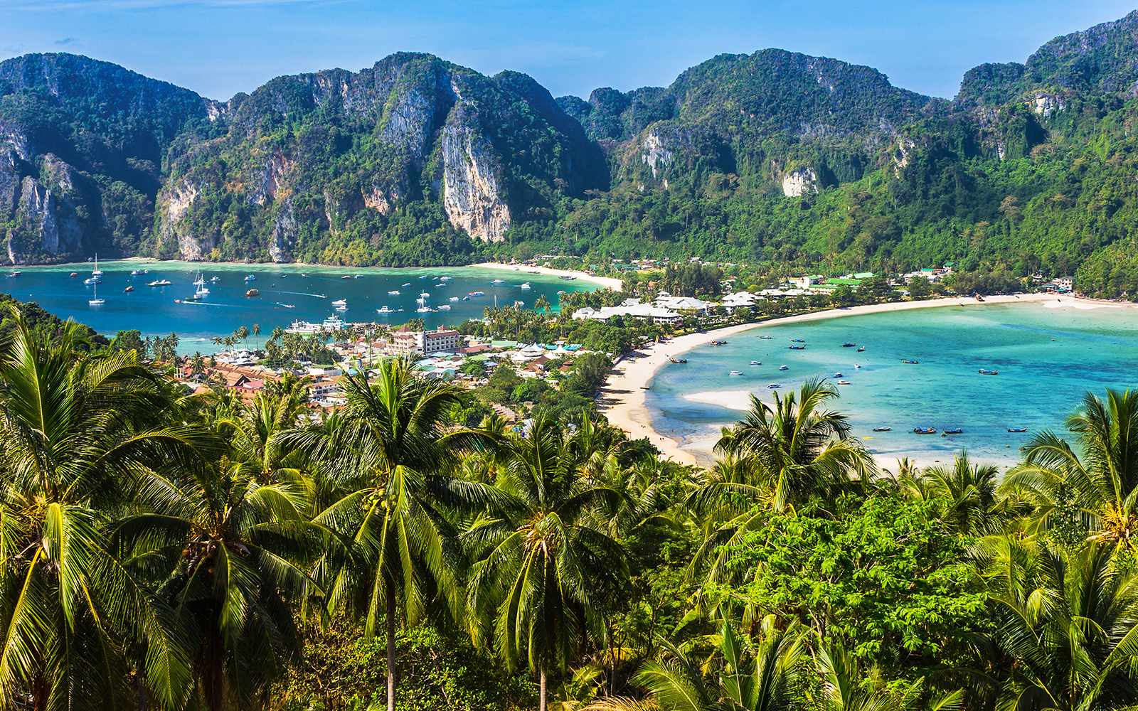 Phi Phi Viewpoint overlooking lush islands and turquoise waters in Thailand.