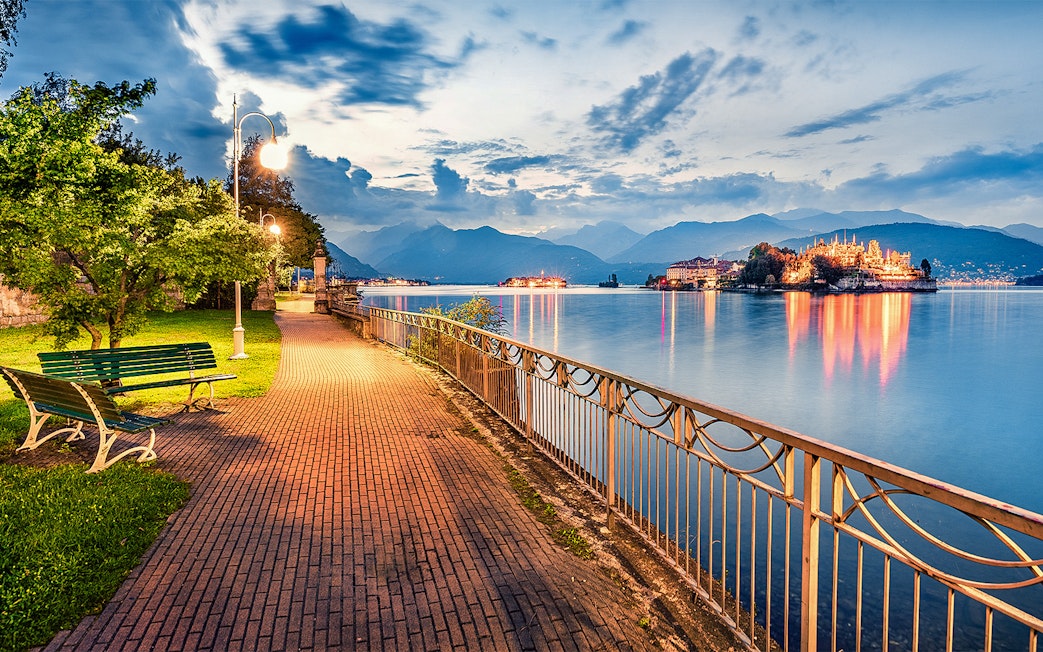 Pathway along Lake Maggiore with view of Isola Bella, Isole Borromee, Italy.
