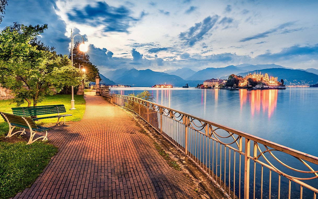 Pathway along Lake Maggiore with view of Isola Bella, Isole Borromee, Italy.