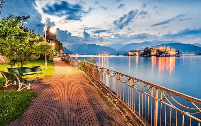 Pathway along Lake Maggiore with view of Isola Bella, Isole Borromee, Italy.
