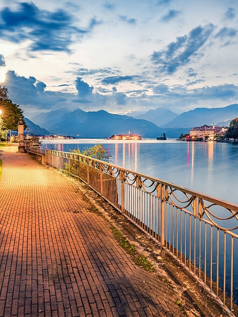 Pathway along Lake Maggiore with view of Isola Bella, Isole Borromee, Italy.