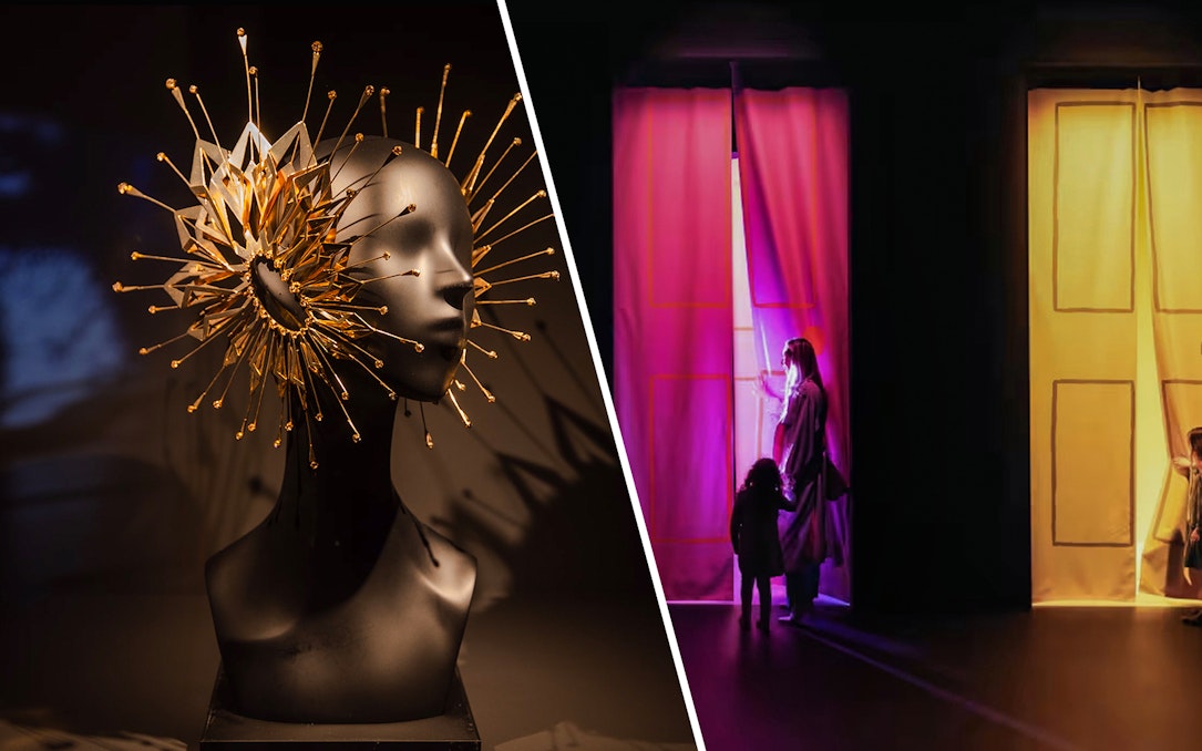 Mannequin with intricate gold headpiece; woman and child in colorful, illuminated room.