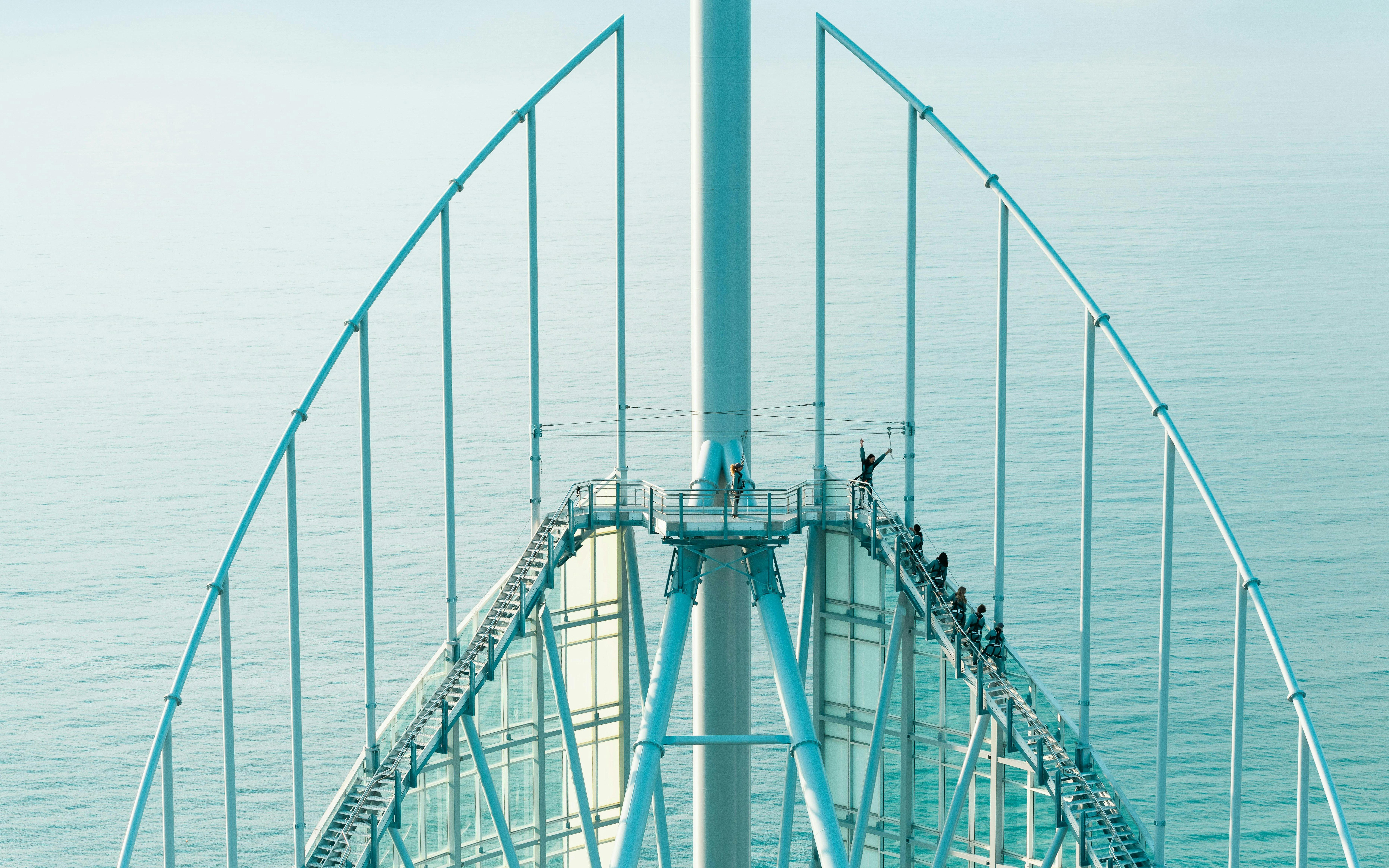 Guests ascending Skypoint Climb with ocean view in Gold Coast, Australia.