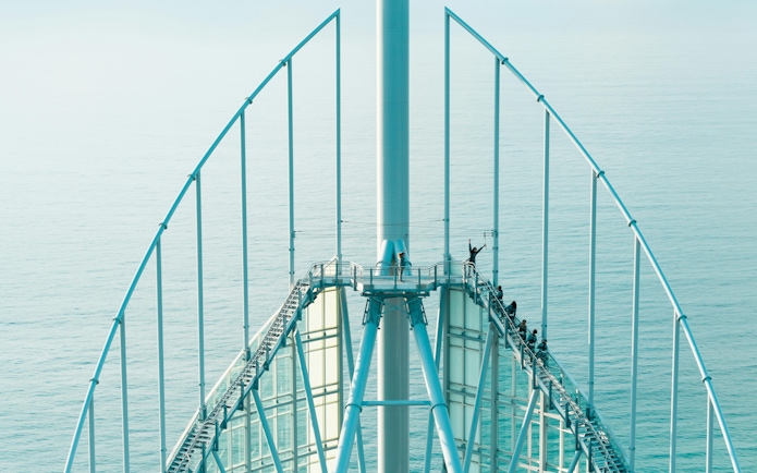 Guests ascending Skypoint Climb with ocean view in Gold Coast, Australia.