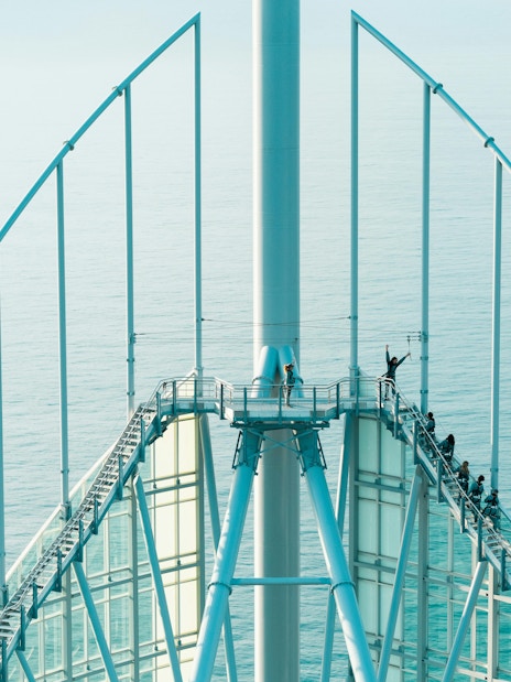 Guests ascending Skypoint Climb with ocean view in Gold Coast, Australia.