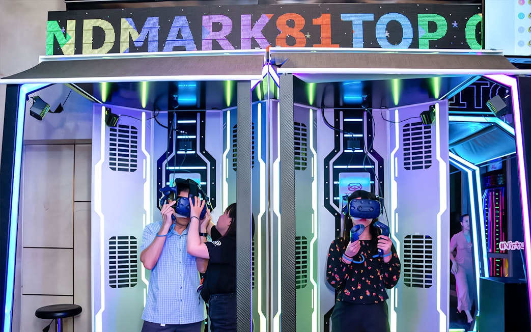 Virtual reality experience at Landmark 81 with visitors using VR headsets.