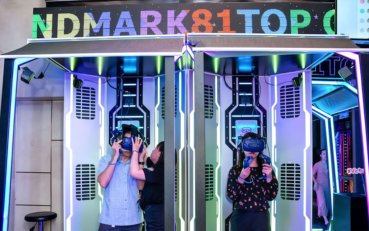 Virtual reality experience at Landmark 81 with visitors using VR headsets.