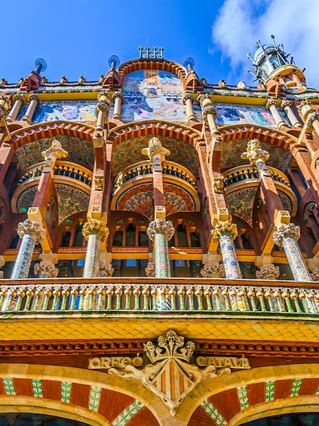 Palau de la Música Catalana facade with ornate columns and mosaics, Barcelona.