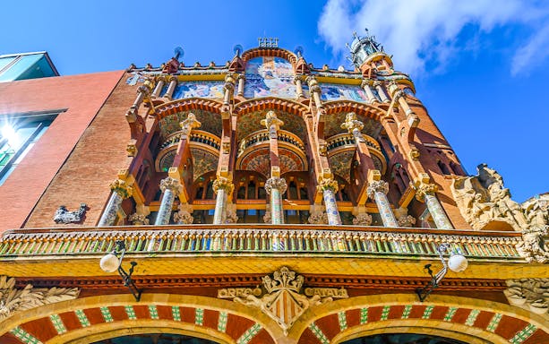 Palau de la Música Catalana facade with ornate columns and mosaics, Barcelona.