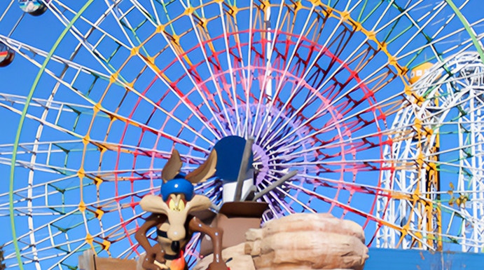 Ferris wheel and cartoon character statue at FujiQ Highland, Japan.