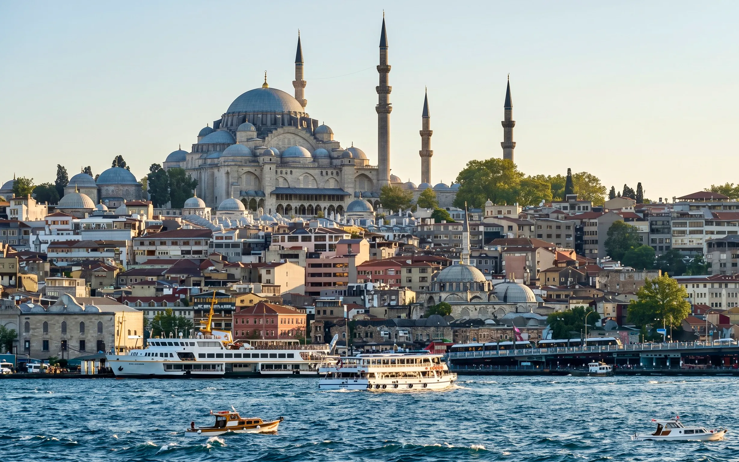 Süleymaniye Mosque overlooking the Bosphorus with boats in Istanbul.