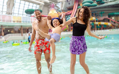 Family enjoying water play at American Dream DreamWorks Water Park.