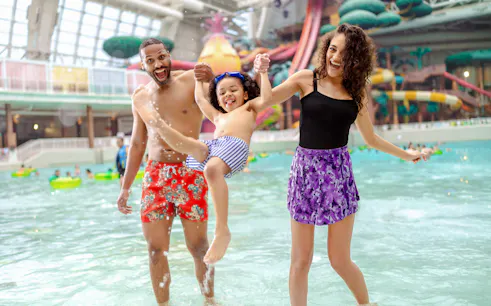 Family enjoying water play at American Dream DreamWorks Water Park.