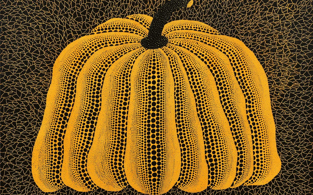 Yayoi Kusama's dotted pumpkin artwork at Stedelijk Museum Amsterdam exhibition.