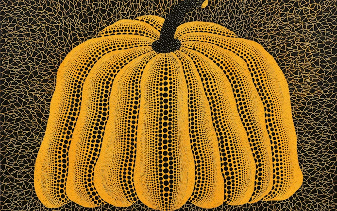 Yayoi Kusama's dotted pumpkin artwork at Stedelijk Museum Amsterdam exhibition.