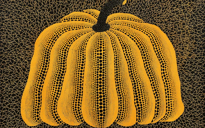 Yayoi Kusama's dotted pumpkin artwork at Stedelijk Museum Amsterdam exhibition.