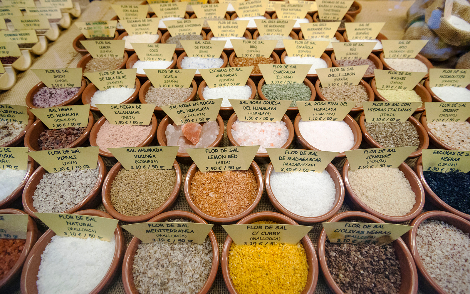 Santa Catalina Market stalls with fresh produce and local goods in Mallorca.