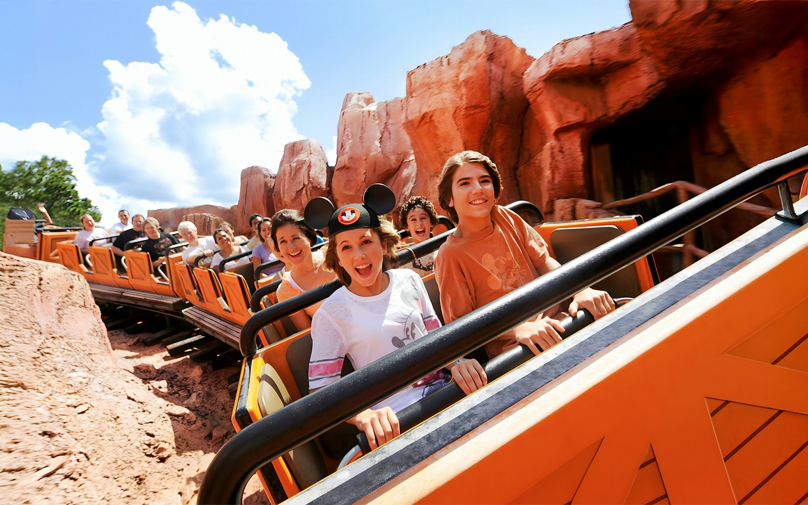 Guests enjoying a rollercoaster at Animal Kingdom Theme Park, Walt Disney World, Orlando.