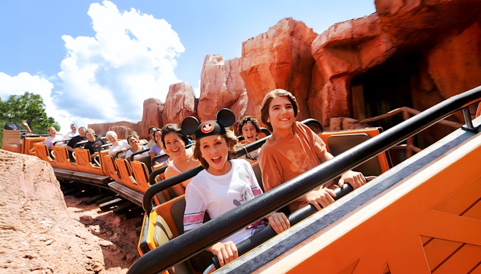 Guests enjoying a rollercoaster at Animal Kingdom Theme Park, Walt Disney World, Orlando.