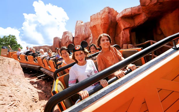 Guests enjoying a rollercoaster at Animal Kingdom Theme Park, Walt Disney World, Orlando.