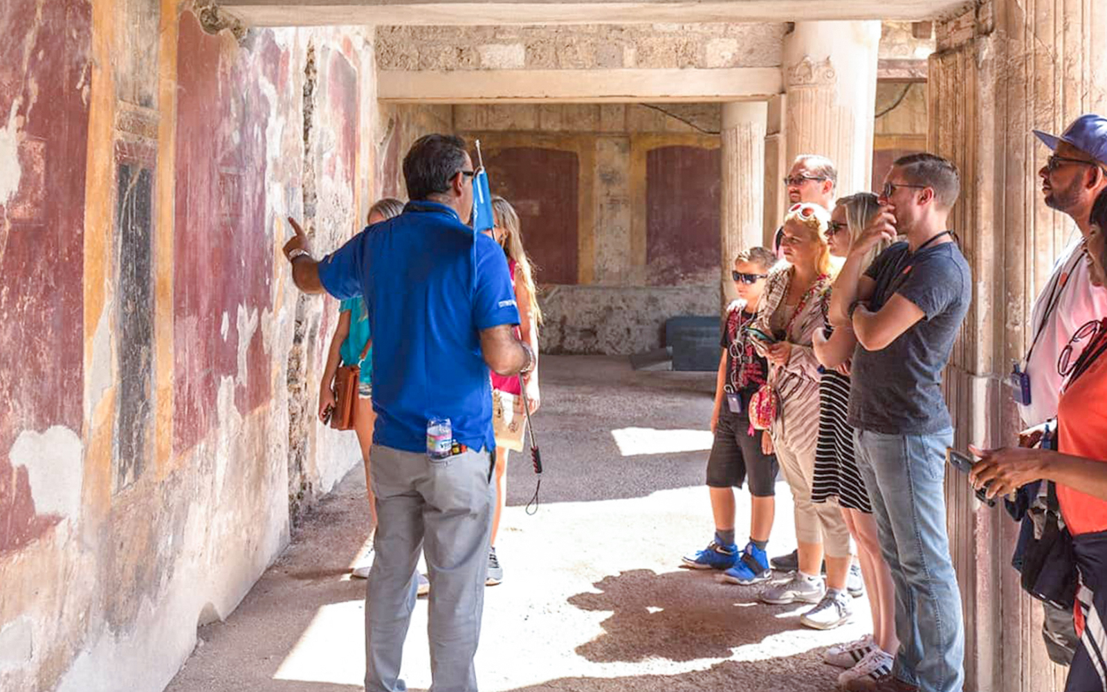 People with guide in pompeii