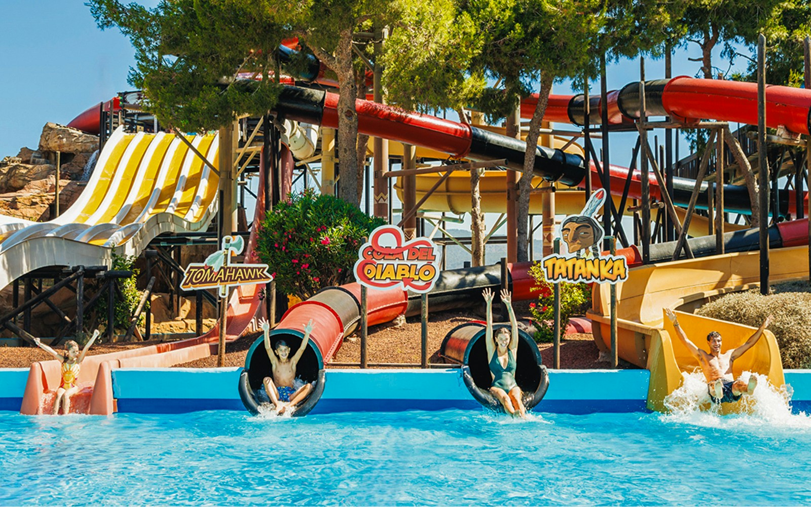Visitors enjoying the Cola del Diablo water slide at Western Water Park.