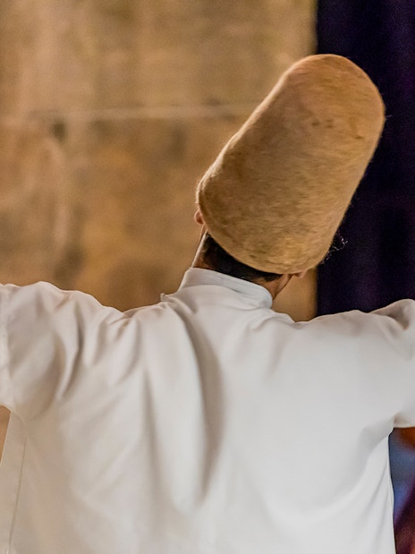 Whirling Dervish performing in Istanbul during Mevlevi Sema ceremony.