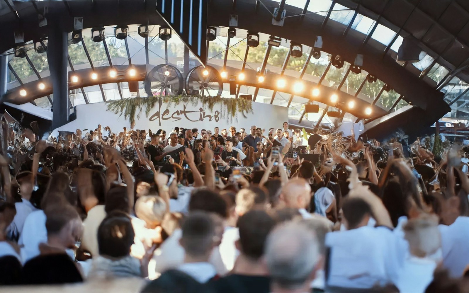 Crowd enjoying a live music event at Destino Ibiza.