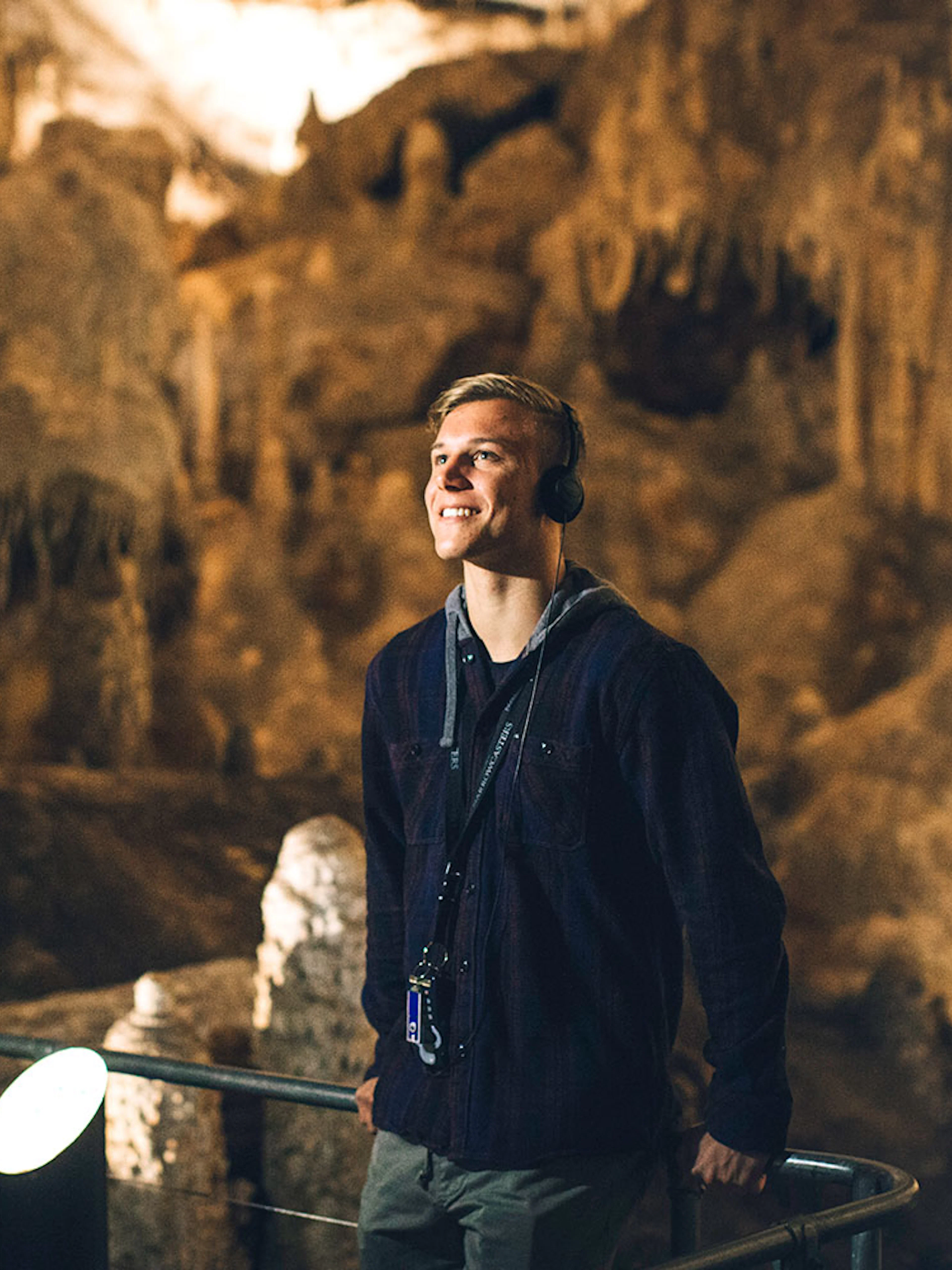 Visitor enjoying Mammoth Cave Margaret River self-guided audio tour.