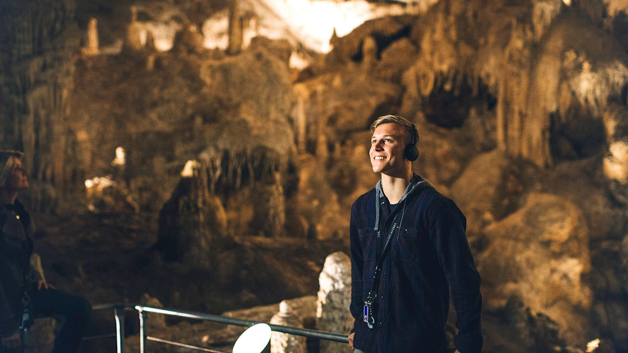 Visitor enjoying Mammoth Cave Margaret River self-guided audio tour.
