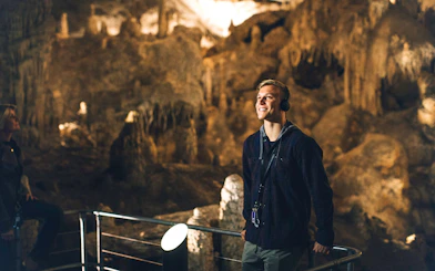 Visitor enjoying Mammoth Cave Margaret River self-guided audio tour.